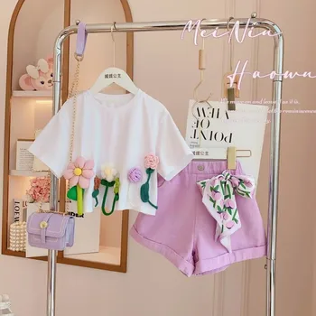 В продаже 2023 новых летних модных комплектов для маленьких девочек, топ с цветочным рисунком + фиолетовые шорты 3-9 Т